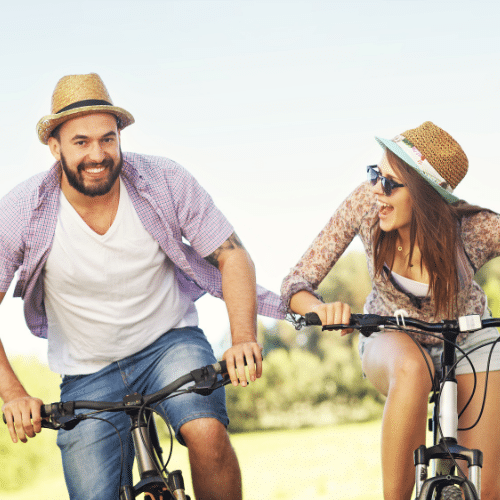 A couple riding bicycles in Roseville, CA